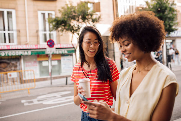 istock Two friends walking and enjoying vacation in Madrid 1400430268
