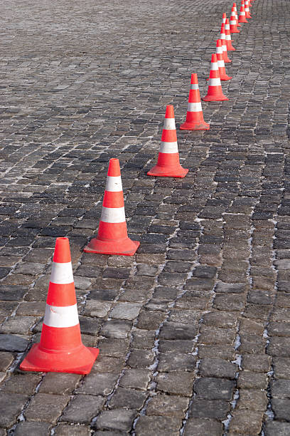 istock Boundary of color cones on the stone pavement 140043369