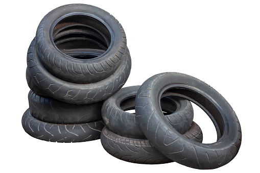 Piled of old car tires isolated on white background included clipping path.