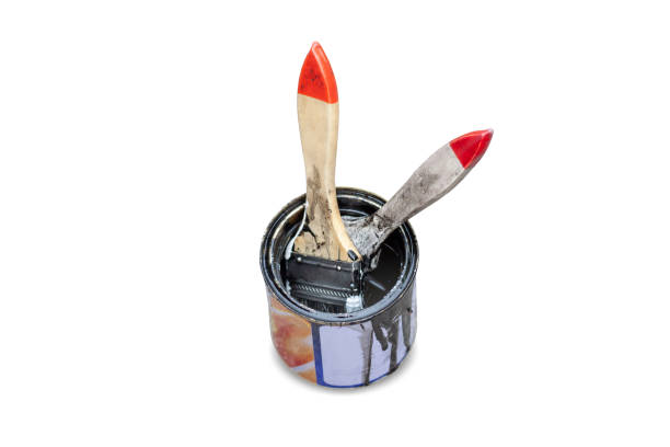 istock Paint brush dipped in the paint can isolated on white background. 1400433938