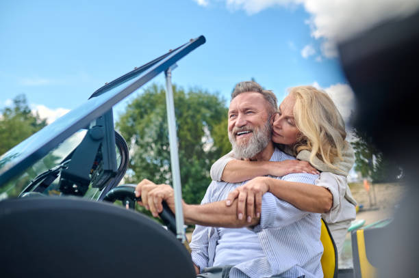 istock A mature couple having a weekend on a river and looking happy 1400434733