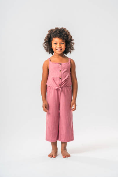 istock African Girl Standing and Smiling 1400437380