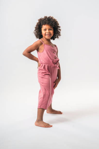 istock African Girl Standing and Smiling 1400437386