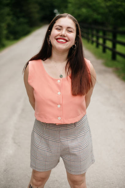 istock Young woman smiling 1400438620