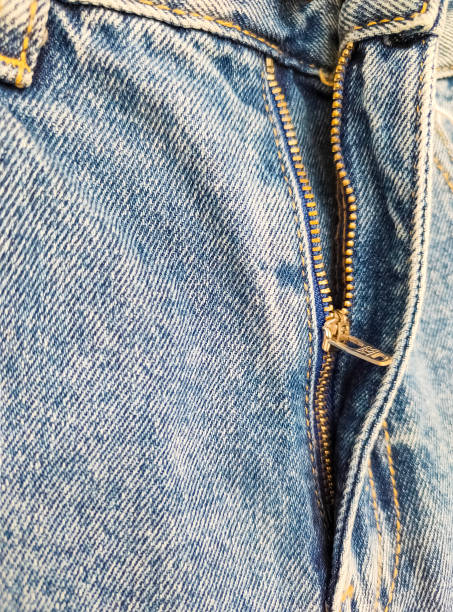 istock Zipper on jeans. Jeans texture. Close-up denim background. Unzipped jeans. 1400440657