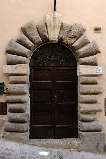 Ancient door in the medieval village of Nocera (Umbria)