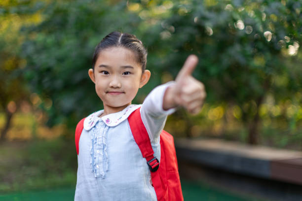istock Little Girl Thumbs Up 1400442242