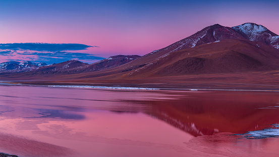 37MPix XXXXL size - this panoramic landscape is an very high resolution multi-frame composite and is suitable for large scale printing. Sunrise over Laguna Colorada, Bolivian Altiplano. The Altiplano (Spanish for high plain), in west-central South America, where the Andes are at their widest, is the most extensive area of high plateau on earth outside of Tibet. Lake Titicaca is its best known geographical feature. The Altiplano is an area of inland drainage (endorheism) lying in the central Andes, occupying parts of Northern Chile and Argentina, Western Bolivia and Southern Peru. Its height averages about 3,750 meters (12,300 feet), slightly less than that of Tibet.