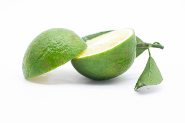 istock half slice mandarines or Tangerine green isolate on a white background 1400443511
