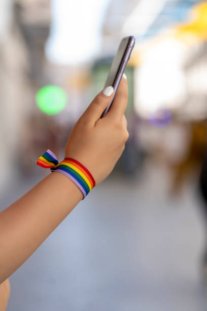 istock hand with bracelet handled his smartphone 1400443556