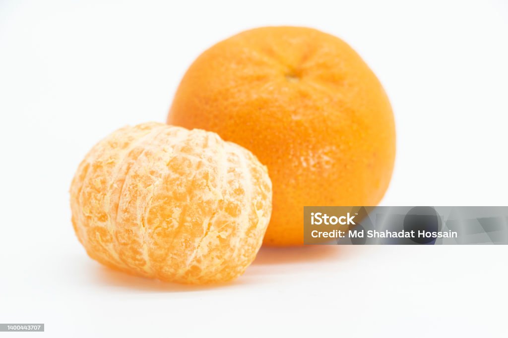whole and slice Tangerine or komola isolated on white background, top view Bangladesh Stock Photo