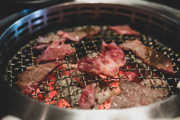 japanese style grilled meat or barbecue, yakiniku is traditional grilled meat cuisine, close up - buffet japanese cuisine lifestyles ready to eat imagens e fotografias de stock