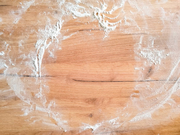 istock White flour on wooden table. Free space for text. View from above. Top view 1400446340