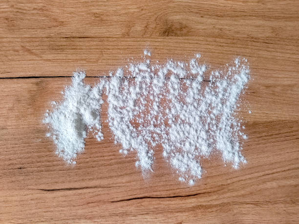 istock White flour on wooden table. Free space for text. View from above. Top view 1400446408