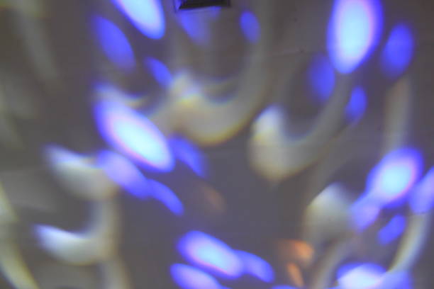 istock Blurred background walls are exposed to general and blue light projections 1400447104