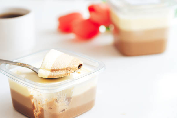 istock Puffed bird's milk of three types in plastic containers with spoon 1400448011