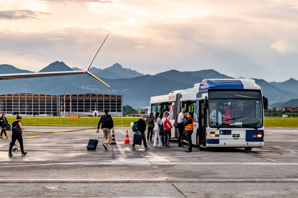 Bergamo, Italy. Tuesday 24 May 2022. People getting a bus transport from plane to airport in Bergamo.