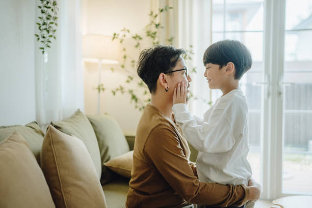 istock Father playing with his little son at home 1400450955