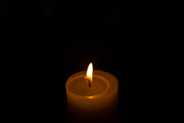 istock Warm candlelight on a dark mysterious background 1400451843