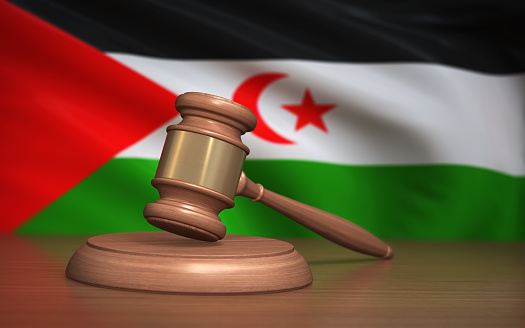 3d Render Judge Gavel and Western Sahara flag on background (Depth Of Field)