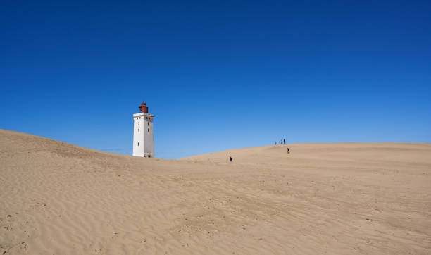 istock Rubjerg Knude lighthouse on sandy hill at coastline 1400454495