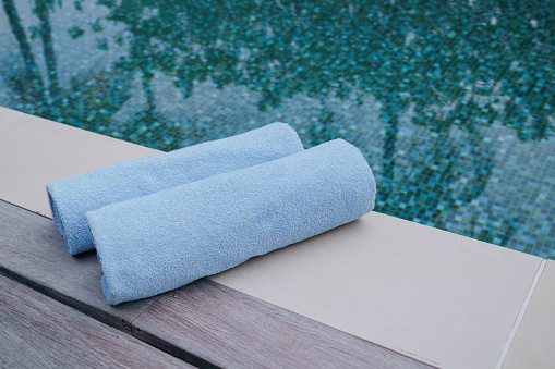 Two blue towels by the pool. in Malé, Male, Maldives