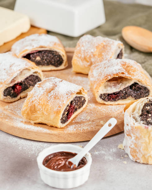 strudel (pastry) with poppy seeds and cherries