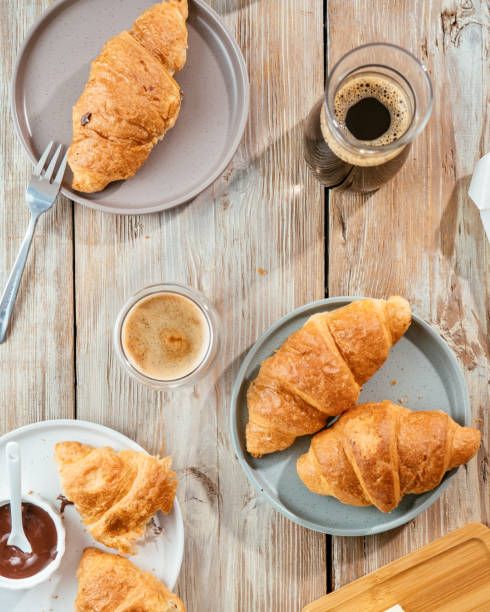 istock Breakfast with croissants and fresh coffee 1400455939