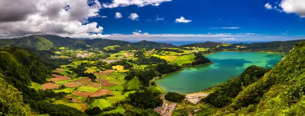 Aerial view of Lagoa das Furnas located on the Azorean island of Sao Miguel, Azores, Portugal. Lake Furnas (Lagoa das Furnas) on Sao Miguel, Azores, Portugal from the Pico do Ferro scenic viewpoint.