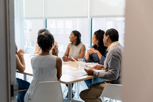 istock Social media team meets with expert advisor 1400460103