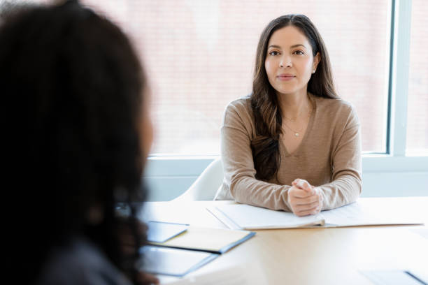 istock Team lead listens to a new candidate 1400460126
