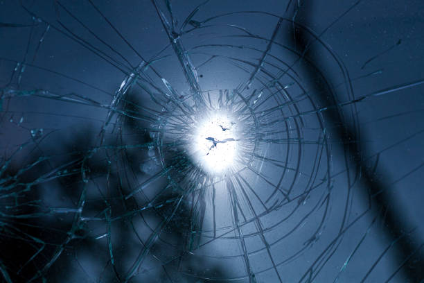 istock broken glass,background of cracked window 1400461532