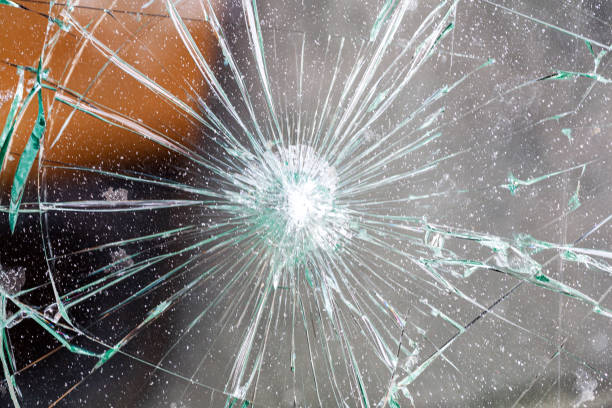 istock broken glass,background of cracked window 1400461598