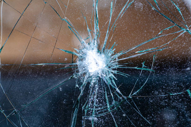 istock broken glass,background of cracked window 1400461648