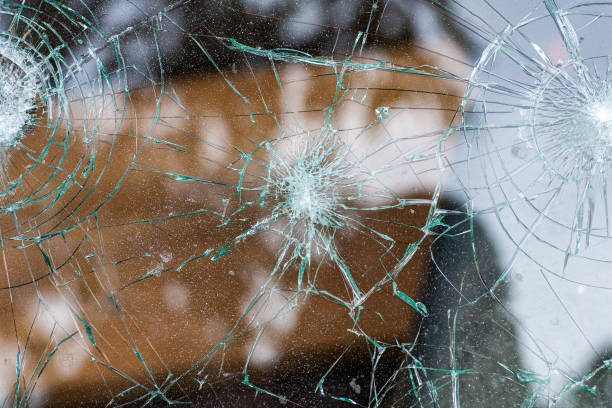 istock broken glass,background of cracked window 1400461675