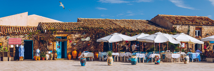 The picturesque village of Marzamemi, in the province of Syracuse, Sicily. Square of Marzamemi, a small fishing village, Siracusa province, Sicily, italy, Europe.