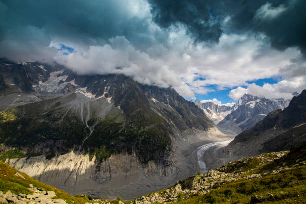 istock Summer scenery in the French Alps with Larix trees and sharp peaks 1400467362