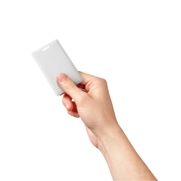 istock Caucasian hand holding a white proximity card, isolated 1400469088