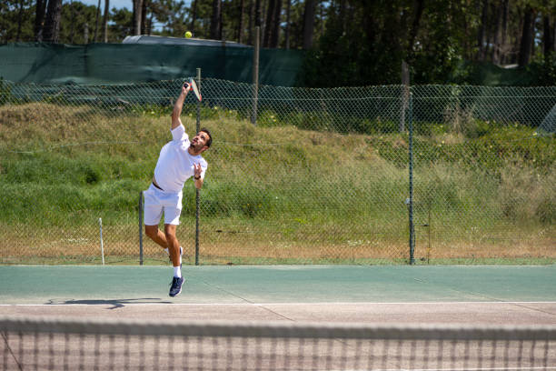 istock Tennis player performing a service 1400472389