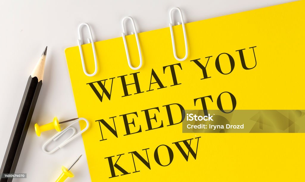 WHAT YOU NEED TO NOW word on yellow paper with office tools on white background WHAT YOU NEED TO NOW word on yellow paper with office tools on a white background Expertise Stock Photo