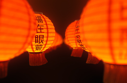 Large group of floating red lanterns on Chinese New Year, covered with well wishes and good fortunes.