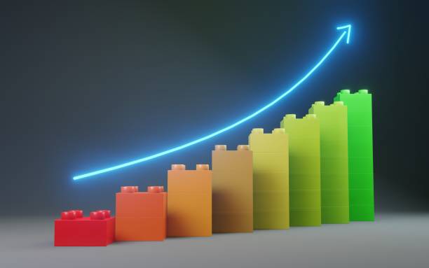 istock Growing bar chart from color toy blocks on blue background. 3D ilustration. Growing graph from building blocks. 3D Ilustartion. 1400477536