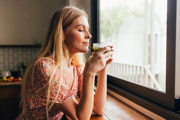 istock Blonde Woman Drinking Herbal Tea 1400481119