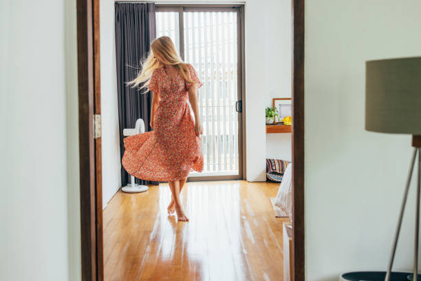 istock Blonde Woman Dancing In Her Bedroom 1400481139