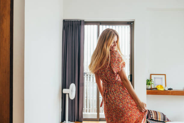 istock Blonde Woman Dancing In Her Bedroom 1400481143