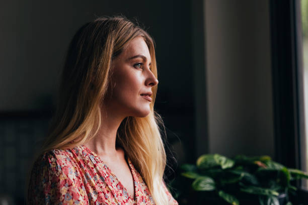 istock Blonde Woman Looking Away 1400481319