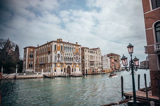 VENICE, ITALY - MAY 03, 2016: View of Buildings on Riva del Vin on the Grand Canal, Venice. The one on the right is Hotel Ovidius.