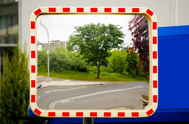 istock Outdoor traffic mirror for blind spots on the road. 1400485706