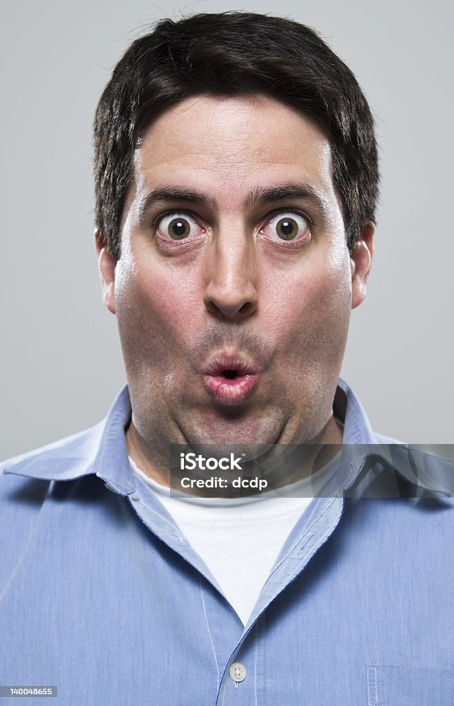 Uomo eccitato sorpreso e - Foto stock royalty-free di Adulto