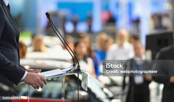 Politician Speaking Publicly From The Lectern Stock Photo - Download Image Now - Press Conference, Government, Meeting